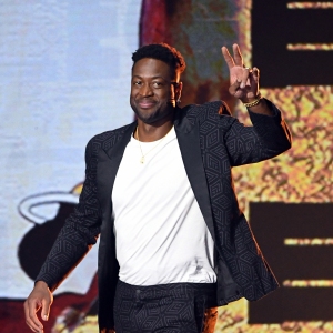 Dwyane Wade accepts the Legend Award onstage during Nickelodeon Kids' Choice Sports