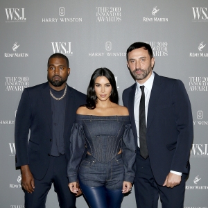Kanye West, Kim Kardashian West and Riccardo Tisci attend the WSJ.