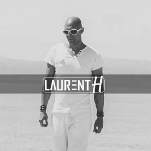 LAURENT H.